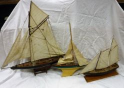 A Milbro Product "Ailsa" pond yacht together with two further model sail boats CONDITION