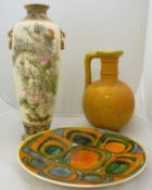 A Poole Pottery charger,