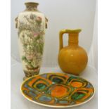 A Poole Pottery charger,