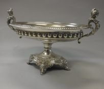 A late 19th Century German silver and silver gilt centre piece in the classical manner with figural