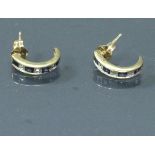 A pair of sapphire and diamond set hoop earrings