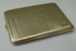 A 9 carat gold engine turned cigarette case bearing initials "JWB",