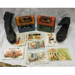 A box containing various model cars, a pair of vintage leather lace up ladies boots,