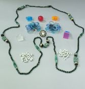 A collection of 1960's and later plastic jewellery to include various rings, earrings, etc,