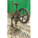 A cast iron Union manual drill press
