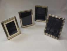 Four various modern silver photograph frames