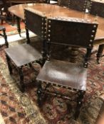 A set of six 19th Century dining/hall chairs in the Cromwellian manner with brass studwork and