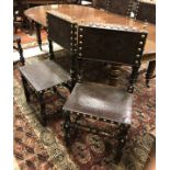 A set of six 19th Century dining/hall chairs in the Cromwellian manner with brass studwork and