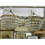 A set of four cut glass and brass mounted ceiling bag lights