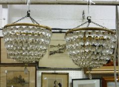 A set of four cut glass and brass mounted ceiling bag lights