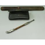A 19th Century opium pipe and case with Carnelian bead and leather opium pouch