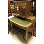 A Victorian style writing desk with mirrored cupboard doors,