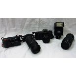 A Canon T50 camera together with bag of various accessories,