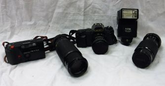 A Canon T50 camera together with bag of various accessories,