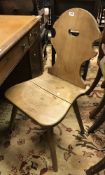 A mid 20th Century beech panel-seated hall chair of typical form,