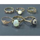 A collection of six 9 carat gold and various stone set rings 13 g