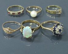 A collection of six 9 carat gold and various stone set rings 13 g