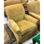 A pair of modern yellow cord upholstered armchairs in the Victorian manner raised on turned front