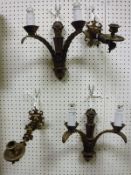 A pair of Victorian brass candle wall sconces in the Gothic style together with a pair of modern