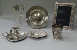 A box containing assorted plated wares to include chamberstick, photo frames, cups,