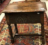 A 17th Century style oak boxed seat stool with single piece top and moulded edge over slightly