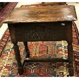 A 17th Century style oak boxed seat stool with single piece top and moulded edge over slightly