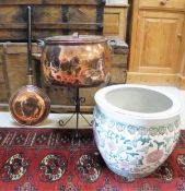 A Victorian oval copper lidded cooking vessel and a 19th Century copper warming pan (handle cut