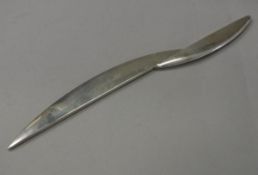 A modern silver paper knife of dual elliptical form (by Graham Stewart of Dunblane,