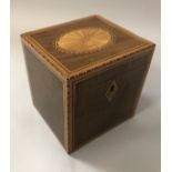 A 19th Century mahogany and marquetry inlaid single section tea caddy with fan inlaid medallion to