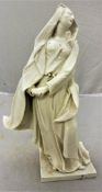 A 19th Century Nymphenburg blanc-de-chine figure of "The Mourning Madonna" after the original by