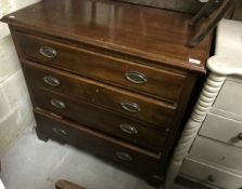 A mahogany square front chest of four long drawers