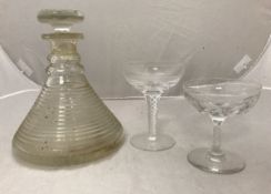 A set of seven facet cut glass champagne saucers,