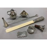 A silver Guernsey cream jug, a silver handled ivory paperknife, a silver candle snuffer,
