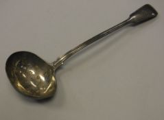 A Victorian silver "Thread and Fiddle" pattern soup ladle (by George W Adams (Chawner & Co.