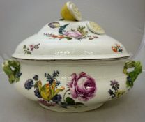 A Meissen porcelain tureen of oval form with floral spray decoration and fence relief banding,