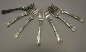 A set of seven silver "King's" pattern dessert forks (by Jonathon Round, Sheffield 1902),