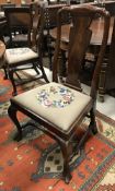 A set of eight early 20th Century Queen Anne style chairs with shaped bars and splat backs,