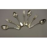 A set of five Georgian silver "Fiddle" pattern dessert forks and four spoons (by John Kerschner,