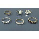 A collection of six 9 carat gold dress rings set with varying stones 13.