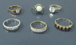 A collection of six 9 carat gold dress rings set with varying stones 13.