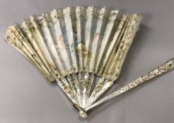 A 19th Century French mother of pearl stick fan with hand painted decoration of classical maiden