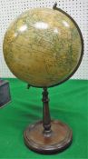 A terrestrial globe on mahogany stand with label inscribed "Geographia 8" terrestrial globe