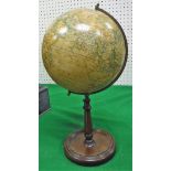 A terrestrial globe on mahogany stand with label inscribed "Geographia 8" terrestrial globe