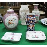 A Chinese famille-rose baluster shaped vase, similarly decorated ginger jar and cover,