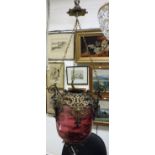 A cranberry glass and lacquered brass mounted ceiling lantern in the baroque style