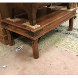 A modern Indian teak coffee table together with a Victorian oak spindle back office chair
