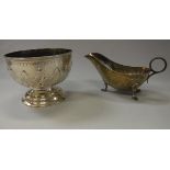 An Edwardian silver rose bowl (Biringham 1903) and a George V silver sauce boat (James Dixon and