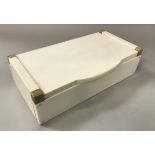 A 1930s ivory and horn lidded box of plain form in the Art Deco style