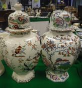 A Mason's ironstone fruiting tree decorated octagonal baluster shaped vase and cover,