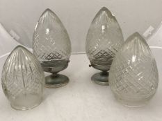 A set of three pineapple cut glass light shades,